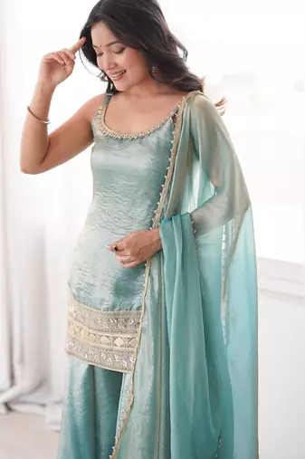 Teal green strappy kurta and sharara set with matching dupatta