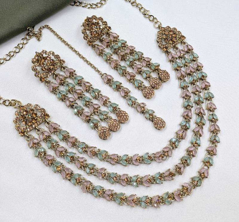 Pink & pista mehandi-plated agate stone necklace set with earrings & maang tikka