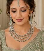 Pista mehandi-plated agate stone necklace set with earrings & maang tikka