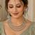 Pista mehandi-plated agate stone necklace set with earrings & maang tikka