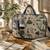  petal posh ivory & navy floral jacquard laptop bag (upto 16")