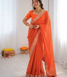 Orange embroidered bandhani print faux georgette saree with unstitched mono benglori silk blouse