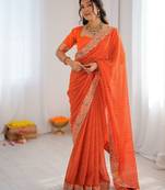 Orange embroidered bandhani print faux georgette saree with unstitched mono benglori silk blouse