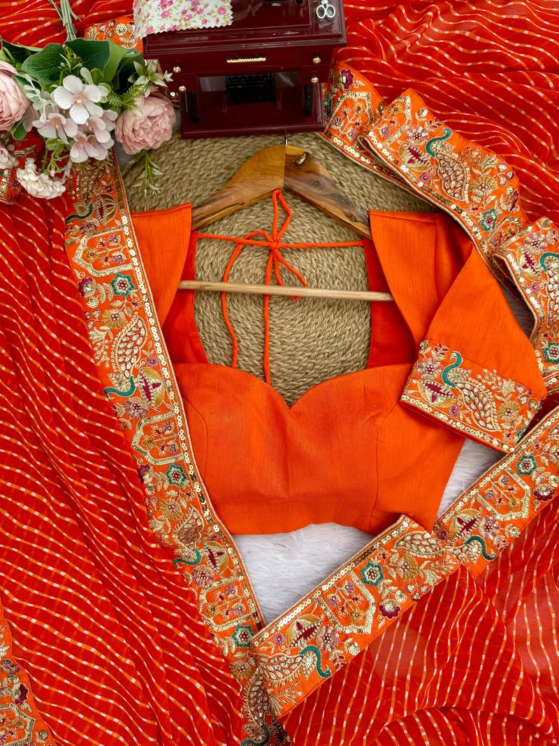 Orange embroidered bandhani print faux georgette saree with unstitched mono benglori silk blouse