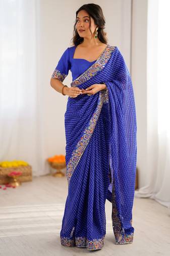 Royal blue thread & sequins embroidered faux georgette bandhani print saree with unstitched blouse