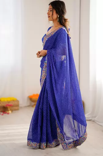 Royal blue thread & sequins embroidered faux georgette bandhani print saree with unstitched blouse