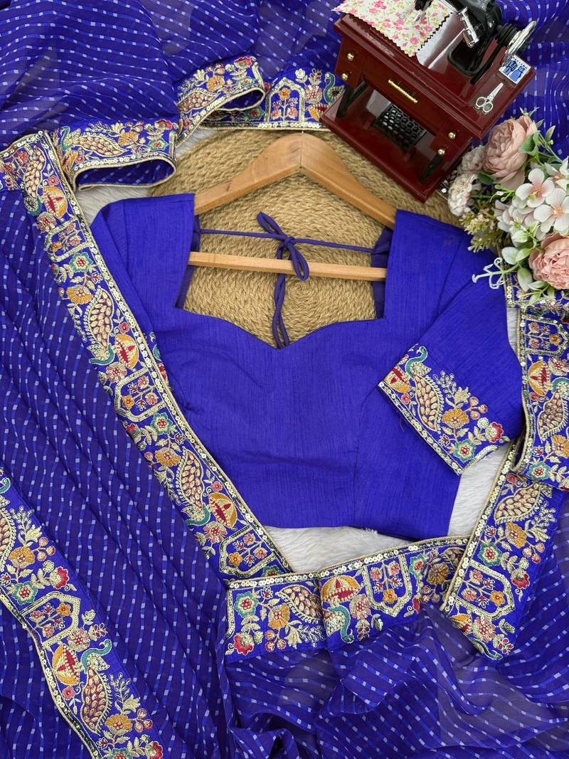 Royal blue thread & sequins embroidered faux georgette bandhani print saree with unstitched blouse