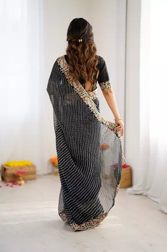 Black thread & sequins embroidered faux georgette bandhani print saree with unstitched banglori silk blouse