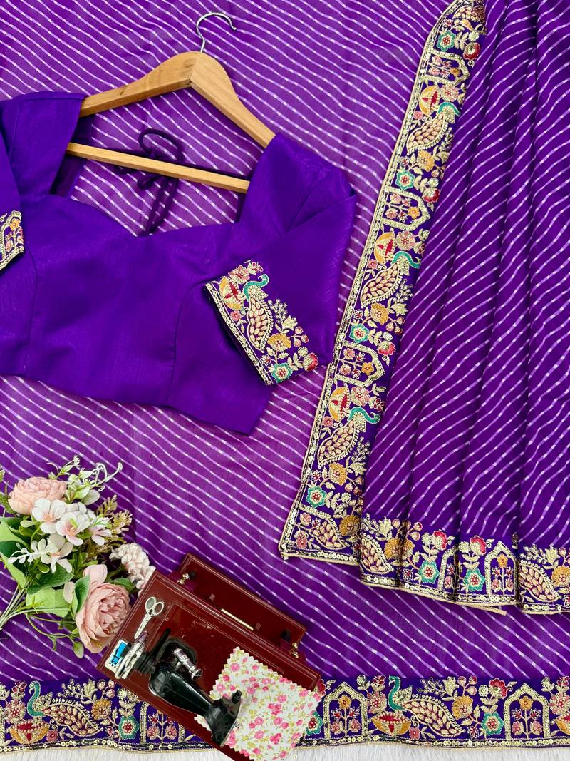 Purple thread & sequins embroidered faux georgette bandhani print saree with unstitched banglori silk blouse