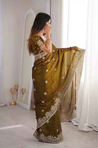 Olive green zari embroidered crush tissue saree with hotfix work and unstitched blouse