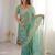 Sea green embroidered organza saree with zari border & unstitched blouse