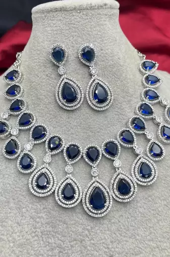 sapphire crystal teardrop necklace and earrings set, silver halo bridal jewellery