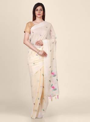 Cream-coloured embroidered linen blend saree 1