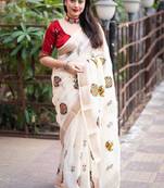 White floral embroidered zari linen saree