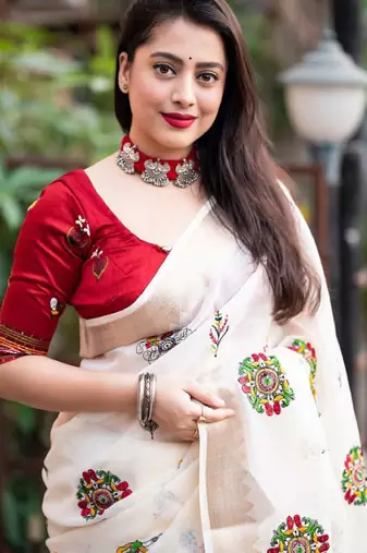 White floral embroidered zari linen saree