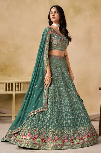 TURQUOISE SEQUINS & THREAD EMBROIDERED GEORGETTE STITCHED LEHENGA CHOLI