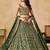 GREEN SEQUINS & THREAD EMBROIDERED GEORGETTE STITCHED LEHENGA CHOLI