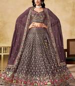 LIGHT PURPLE SEQUINS & THREAD EMBROIDERED GEORGETTE STITCHED LEHENGA CHOLI
