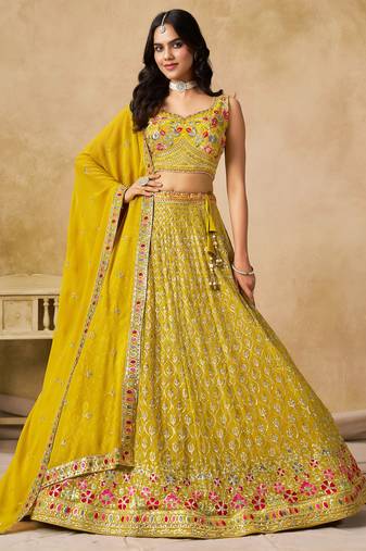 YELLOW SEQUINS & THREAD EMBROIDERED GEORGETTE STITCHED LEHENGA CHOLI