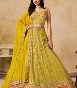 YELLOW SEQUINS & THREAD EMBROIDERED GEORGETTE STITCHED LEHENGA CHOLI