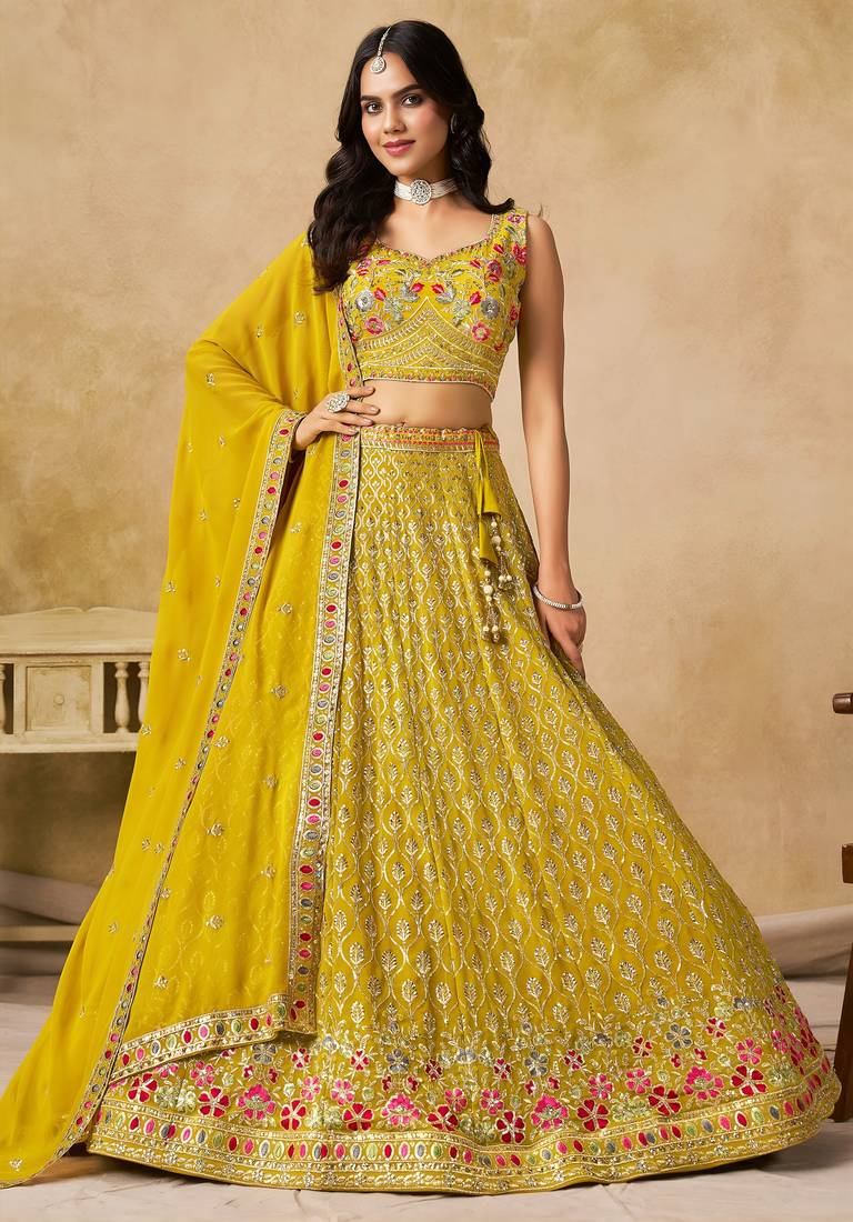 YELLOW SEQUINS & THREAD EMBROIDERED GEORGETTE STITCHED LEHENGA CHOLI