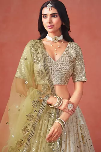 YELLOW GEORGETTE SEQUINS & ZARI EMBROIDERED STITCHED LEHENGA CHOLI