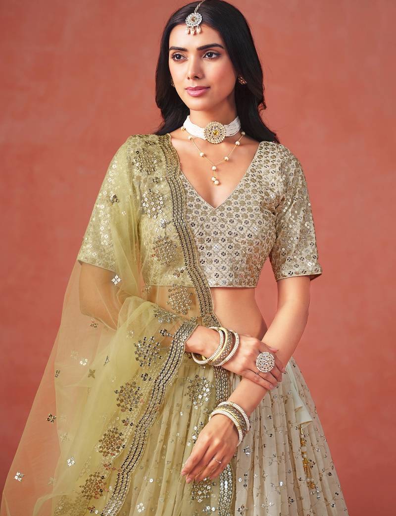 YELLOW GEORGETTE SEQUINS & ZARI EMBROIDERED STITCHED LEHENGA CHOLI