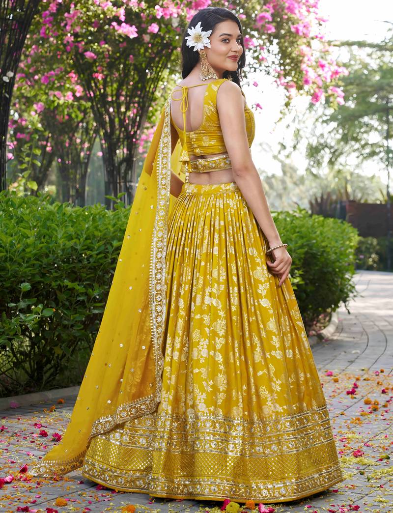 YELLOW DOLA SILK SEQUINS & ZARI EMBROIDERED STITCHED LEHENGA CHOLI