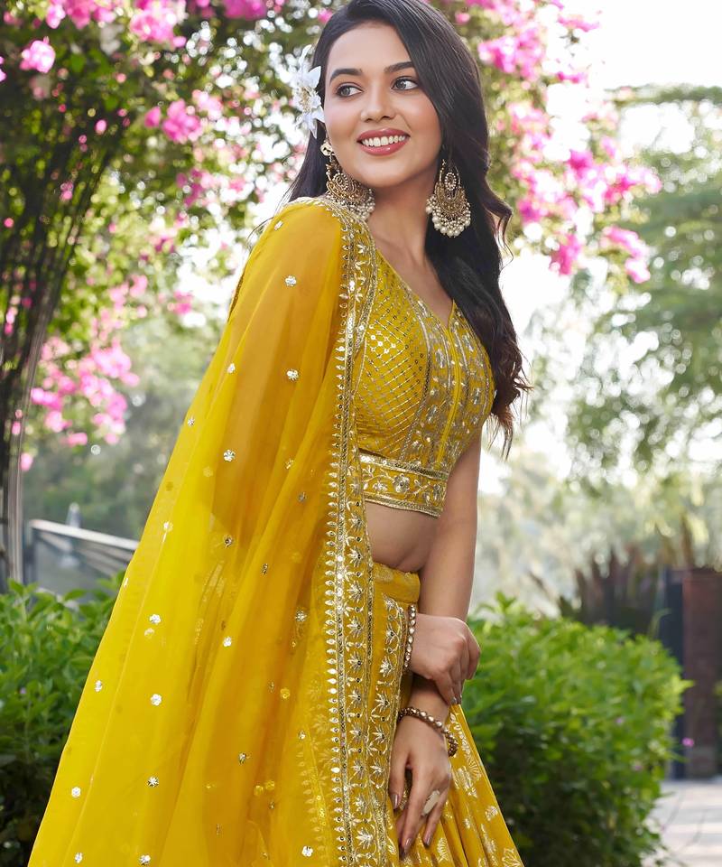 YELLOW DOLA SILK SEQUINS & ZARI EMBROIDERED STITCHED LEHENGA CHOLI