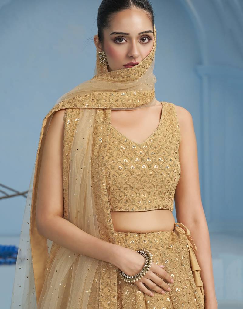 BEIGE GEORGETTE SEQUINS & THREAD EMBROIDERED STITCHED LEHENGA CHOLI
