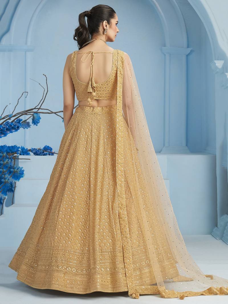 BEIGE GEORGETTE SEQUINS & THREAD EMBROIDERED STITCHED LEHENGA CHOLI