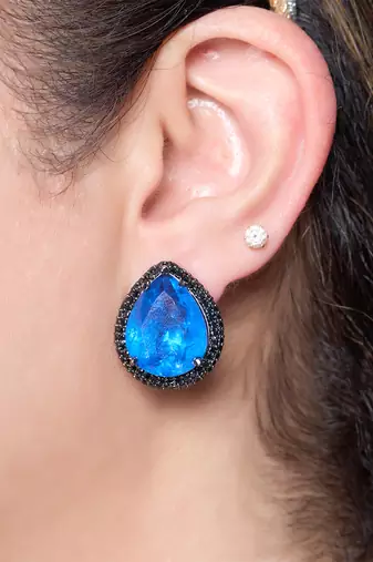Blue stone metallic stud earrings