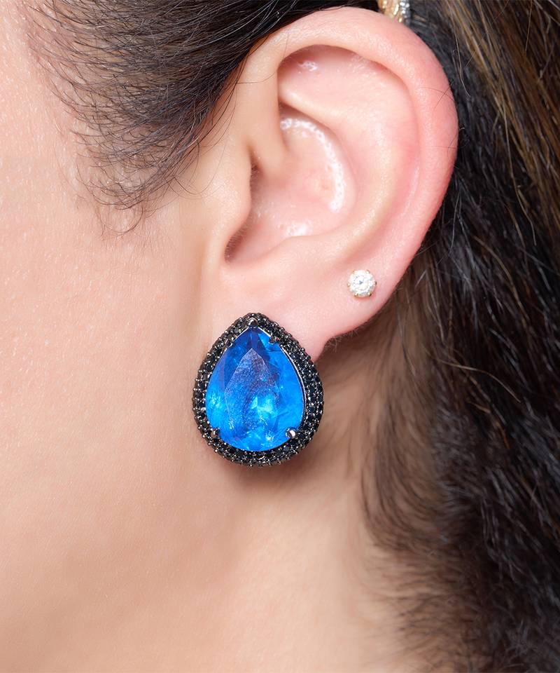 Blue stone metallic stud earrings