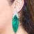 Green stone silver plated drop earrings