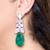 Emerald green stone silver plated drop earrings