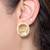 Gold plated floral stud earrings