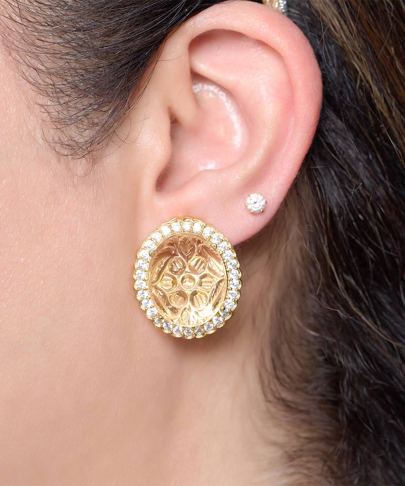 Gold plated floral stud earrings