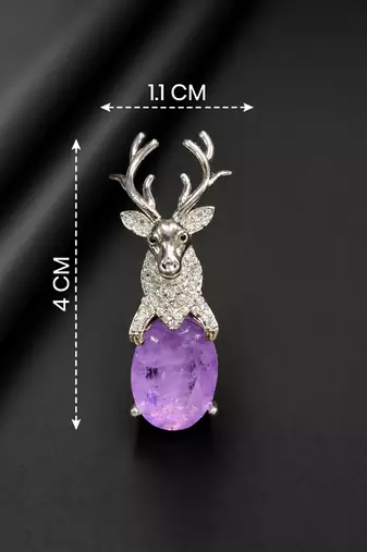 Silver-toned deer brooch pin with purple oval crystal stone
