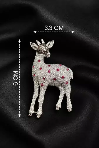 Silver-toned crystal deer brooch pin with ruby red stones 