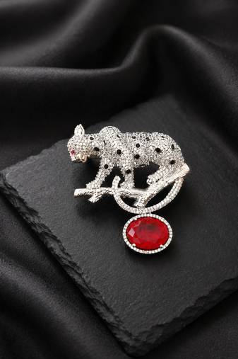 Silver rhodium plated leopard brooch with red crystal drop 