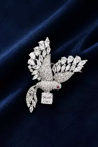 Silver rhodium plated flying bird brooch with silver crystal 