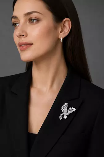 Silver rhodium plated flying bird brooch with silver crystal 