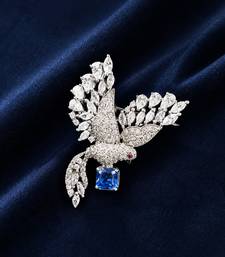 Silver rhodium plated flying bird brooch with blue crystal 
