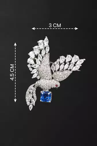 Silver rhodium plated flying bird brooch with blue crystal 