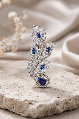 Designer silver-toned blue sapphire leaf brooch pin with cubic zirconia 