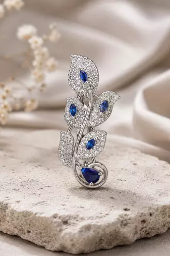 Designer silver-toned blue sapphire leaf brooch pin with cubic zirconia 