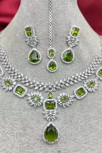 emerald green bridal jewellery set | silver-plated necklace, earrings, maangtika