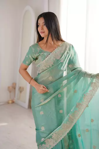 Vibrant firozy festival saree with traditional silver zari embroidery and blouse material