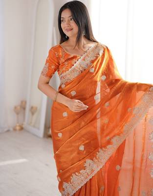 Vibrant rust orange festival saree with traditional silver zari embroidery and blouse material 2