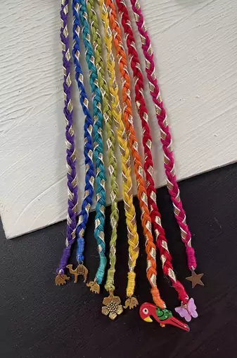 Multicolored handmade rainbow hair braids